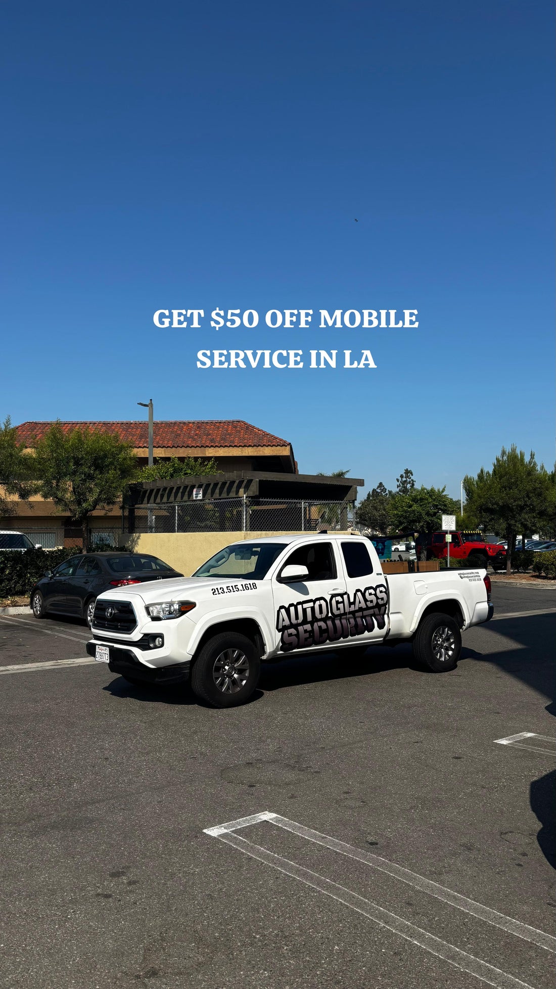 White pickup truck with Auto Glass Security branding offering $25 off mobile windshield replacement service in Los Angeles โ fast, affordable auto glass repair.